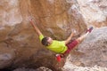 Man Bouldering With Heel Hook Royalty Free Stock Photo