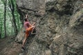 Man bouldering on stone rock Royalty Free Stock Photo