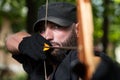 Man With A Bow And Arrows In Woods Royalty Free Stock Photo