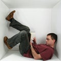 Man in a box Royalty Free Stock Photo