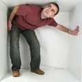 Man in a box Royalty Free Stock Photo