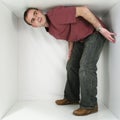 Man in a box Royalty Free Stock Photo