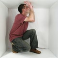 Man in a box Royalty Free Stock Photo