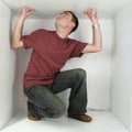 Man in a box Royalty Free Stock Photo
