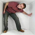 Man in a box Royalty Free Stock Photo