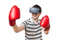 Man is boxing in 3D virtual reality video game with vr headset.