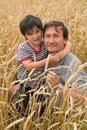 The man with boy on field Royalty Free Stock Photo