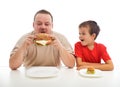 Man and boy with hamburgers Royalty Free Stock Photo