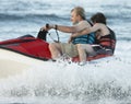 Man and Boy jetskiing in sea Royalty Free Stock Photo