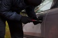 Man breaking into the car