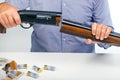 Man breaks rifle. Stop Hunting. Gun Control Royalty Free Stock Photo