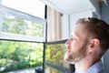 Man Breathing Fresh Air At Home Royalty Free Stock Photo