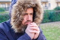 Man dressed in warm clothing to protect himself from cold weather