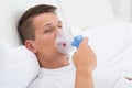 Man Breathing Through Inhaler Mask Royalty Free Stock Photo