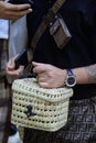 Man with Breitling watch and wicker bag with Fendi trousers before Fendi fashion show, Milan Fashion Royalty Free Stock Photo