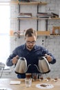 Man brewing fresh cupping coffee Royalty Free Stock Photo