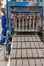 Man and bricks machine Royalty Free Stock Photo