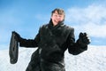 Man with brief-case stands by winter day Royalty Free Stock Photo