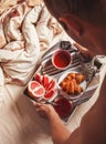 Man bring breakfast in bed