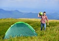 Man bring watermelon for picnic in mountains. Summer vacation. Pleasant hike picnic. Fruits healthy food. Hike picnic Royalty Free Stock Photo