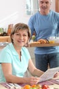 Man bringing his wife breakfast