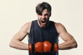 Man with bristle and furious face wears boxing gloves. Boxer makes hits and punches as training. Sports and competition Royalty Free Stock Photo