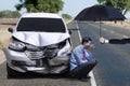 Man with broken car on the street Royalty Free Stock Photo