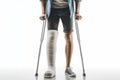 A man with a broken leg in a cast on crutches on a white background. ai generative