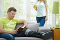 Man with broken leg reading book Royalty Free Stock Photo