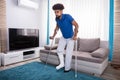 Man With Broken Leg Walking On Carpet Royalty Free Stock Photo