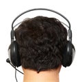 Man the brunette in ear-phones. Royalty Free Stock Photo