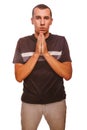 Man brunette prays Christianity hands together Royalty Free Stock Photo