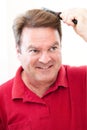 Man Brushing His Hair Royalty Free Stock Photo