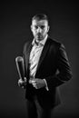 Man with brutal face holding baseball bat. Guy in suit isolated on black background. Fighter with confident look before Royalty Free Stock Photo