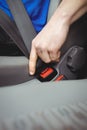 Man buckling his seatbelt Royalty Free Stock Photo