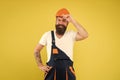 Man builder hard hat. Creativity and practice. Improvement and renovation. Brutal man builder. Bearded guy worker on Royalty Free Stock Photo