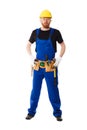 Man builder in the uniform with construction belt