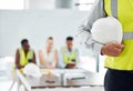 Man, building helmet and construction worker meeting with engineering leadership, manager and employee. Zoom on hand Royalty Free Stock Photo