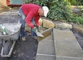 Man building patio steps Royalty Free Stock Photo