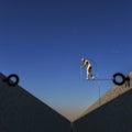 Man building a tightrope Royalty Free Stock Photo