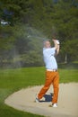 Man at the bunker on a golf course Royalty Free Stock Photo