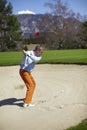 Man at the bunker on a golf course Royalty Free Stock Photo