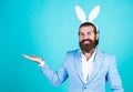 Man in bunny ears. rabbit man wear hare ears. bunny hunt begins. happy hipster with beard. Man in rabbit ears