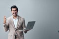 man business copyspace freelancer computer job internet suit handsome smiling laptop