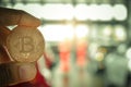 man business holding tecnology bit coin in blurry office background. For business people, finance, lifestyle and ethereum or bloc Royalty Free Stock Photo