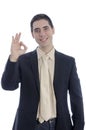 Man in business making the OK gesture over white.