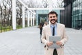 Man business person CEO, leader and strong independent worker portrait outside office building. Male leadership in company,