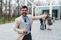 Man business person CEO, leader and strong independent worker portrait outside office building. Male leadership in company,