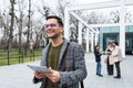 Man business person CEO, leader and strong independent worker portrait outside office building. Male leadership in company,