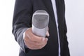 Man in business suit holding microphone - interview concept Royalty Free Stock Photo